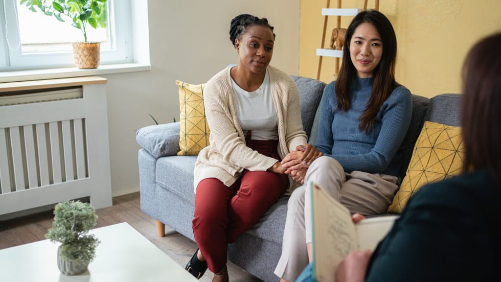 Multiracial lesbian couple, at the couple therapy